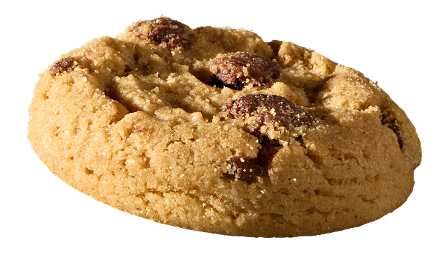 Close-up of a chocolate chip cookie with a crumbly texture.